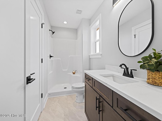 371 Narrow Shore Rd, Aydlett, NC 27916 - bathroom with a shower stall, toilet, vanity, marble look tiles, and recessed lighting