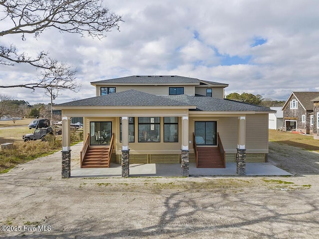371 Narrow Shore Rd, Aydlett, NC 27916 - back of house featuring roof with shingles and entry steps