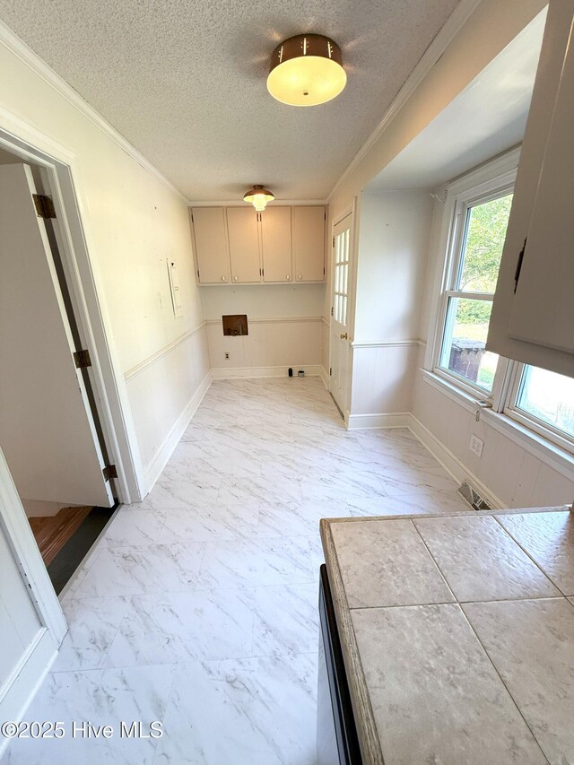 114 Long Leaf Ln, Plymouth, NC 27962 - interior space featuring crown molding, a textured ceiling, visible vents, and marble finish floor