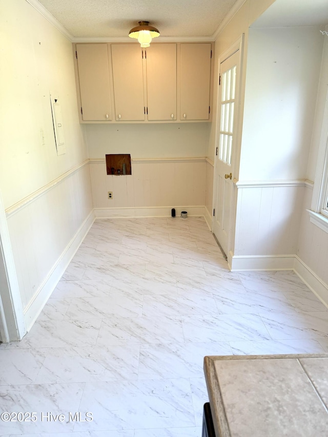 114 Long Leaf Ln, Plymouth, NC 27962 - washroom with wainscoting, crown molding, cabinet space, and marble finish floor
