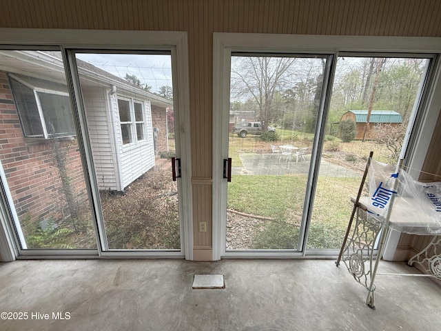 114 Long Leaf Ln, Plymouth, NC 27962 - entryway featuring unfinished concrete flooring and plenty of natural light