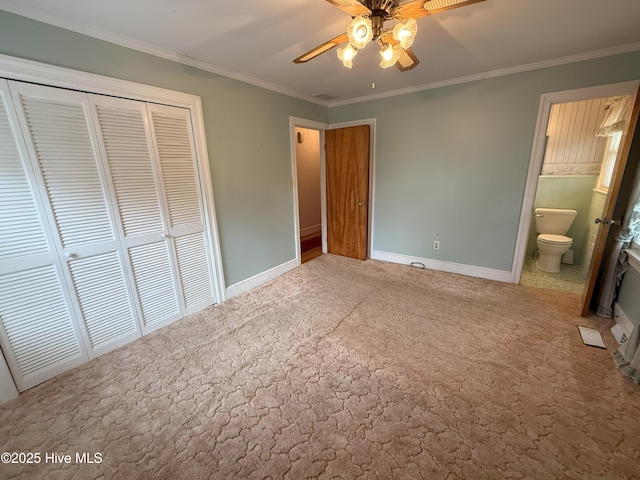 114 Long Leaf Ln, Plymouth, NC 27962 - unfurnished bedroom with a closet, carpet, ensuite bath, crown molding, and baseboards
