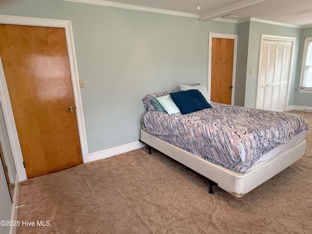 114 Long Leaf Ln, Plymouth, NC 27962 - bedroom with carpet, a closet, baseboards, and ornamental molding