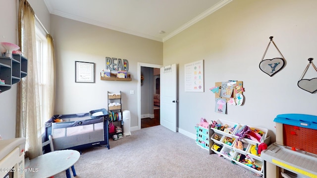 interior space featuring baseboards, carpet, and ornamental molding
