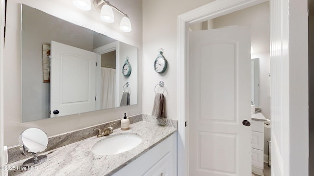 full bathroom featuring vanity