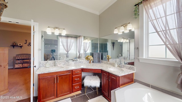 bathroom with crown molding, a sink, double vanity, tiled shower, and a bath