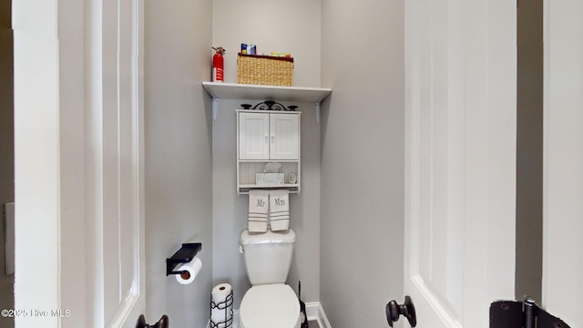 bathroom featuring toilet
