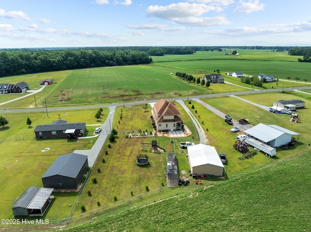birds eye view of property featuring a rural view