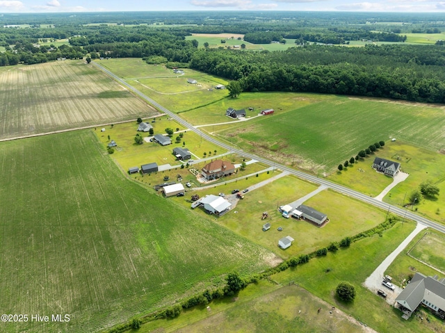 birds eye view of property with a rural view