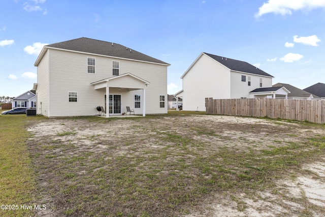 back of property featuring a patio, cooling unit, and fence
