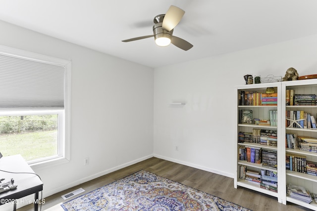 8050 Rachel Wynd Rd NE, Leland, NC 28451 - living area featuring visible vents, baseboards, ceiling fan, and wood finished floors