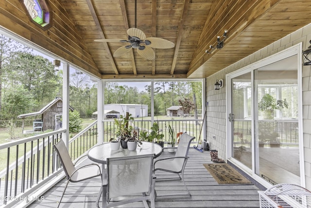 8050 Rachel Wynd Rd NE, Leland, NC 28451 - sunroom / solarium featuring ceiling fan and outdoor dining area
