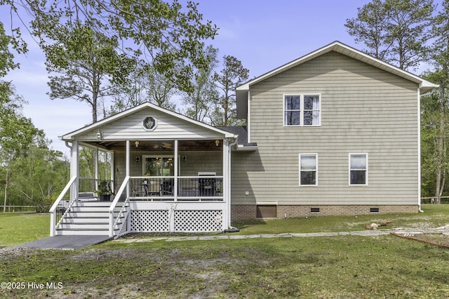 8050 Rachel Wynd Rd NE, Leland, NC 28451 - traditional home with stairway, covered porch, a front lawn, and crawl space