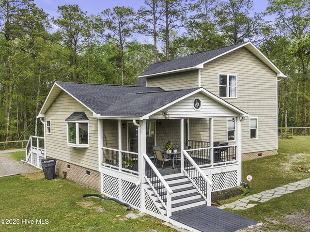 8050 Rachel Wynd Rd NE, Leland, NC 28451 - view of front of home with a shingled roof, a front yard, a porch, and crawl space