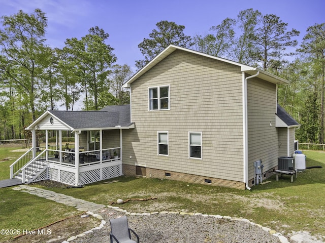 8050 Rachel Wynd Rd NE, Leland, NC 28451 - rear view of property featuring a lawn, central AC unit, roof with shingles, and crawl space