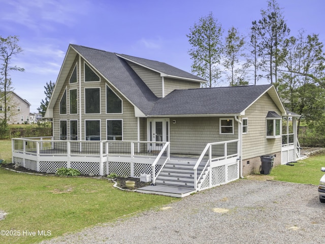 8050 Rachel Wynd Rd NE, Leland, NC 28451 - rear view of property featuring a wooden deck, a shingled roof, and a yard