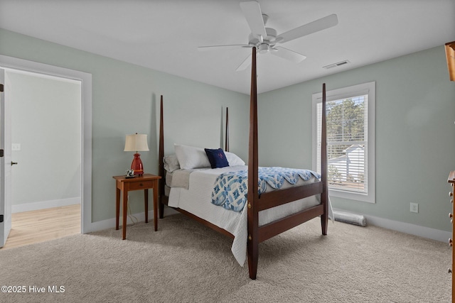 15 Station Ave, Southern Pines, NC 28387 - carpeted bedroom featuring visible vents, baseboards, and ceiling fan