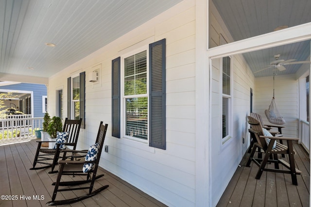 15 Station Ave, Southern Pines, NC 28387 - wooden deck featuring a ceiling fan and covered porch