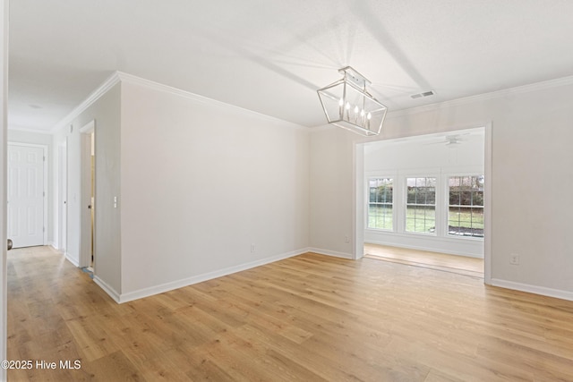 132 Elder Dr, Wilmington, NC 28405 - empty room featuring ornamental molding, light wood-style floors, a ceiling fan, and a chandelier