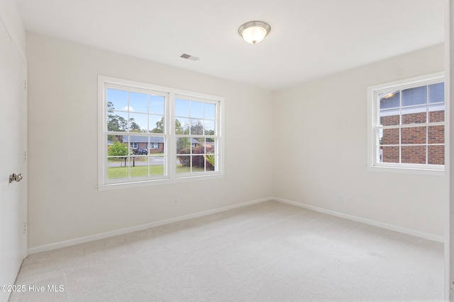 132 Elder Dr, Wilmington, NC 28405 - spare room featuring light colored carpet and baseboards