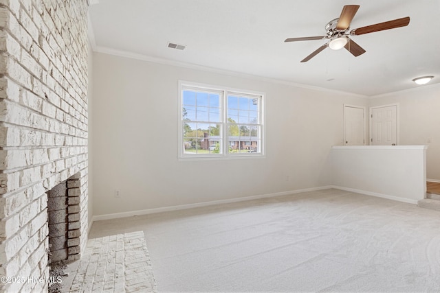 132 Elder Dr, Wilmington, NC 28405 - unfurnished living room with light colored carpet, ornamental molding, a ceiling fan, and a fireplace
