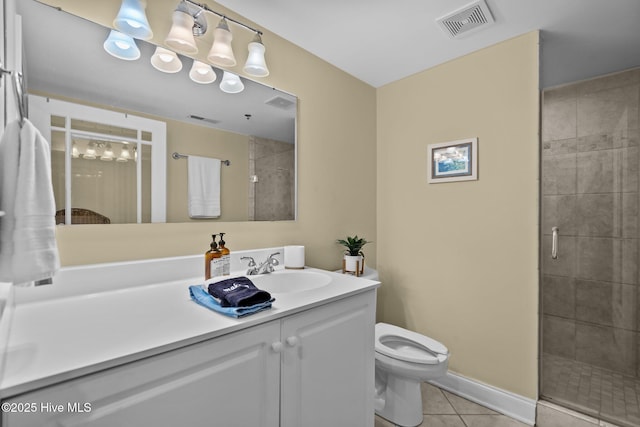 106 N Water Street 205 & 206, Wilmington, NC 28401 - bathroom with tile patterned flooring, toilet, a shower stall, and visible vents