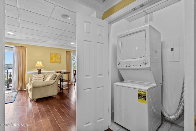 106 N Water Street 205 & 206, Wilmington, NC 28401 - laundry room featuring visible vents, laundry area, stacked washer / drying machine, and wood finished floors