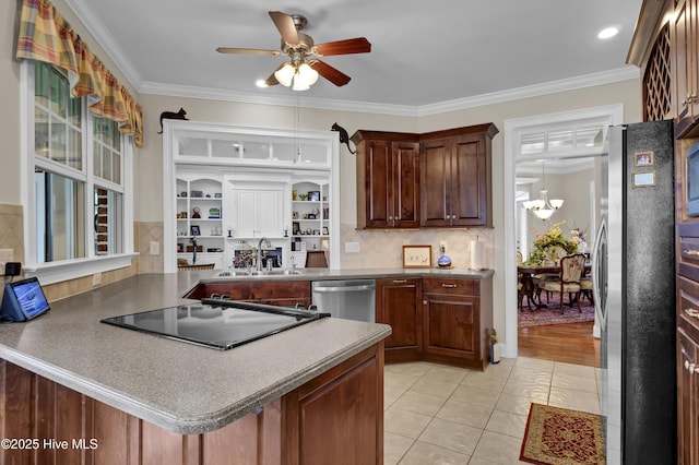 9278 Checkerberry Sq NW, Calabash, NC 28467 - kitchen with stainless steel appliances, a ceiling fan, light tile patterned flooring, ornamental molding, and tasteful backsplash