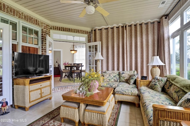 9278 Checkerberry Sq NW, Calabash, NC 28467 - living room with tile patterned flooring and a ceiling fan