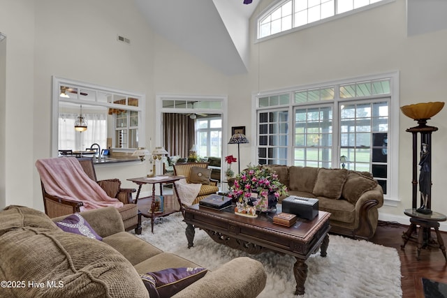 9278 Checkerberry Sq NW, Calabash, NC 28467 - living room featuring high vaulted ceiling and ceiling fan