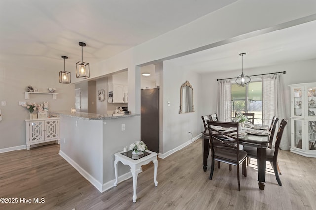 722 Christine Ave, Jacksonville, NC 28540 - dining room with baseboards and wood finished floors