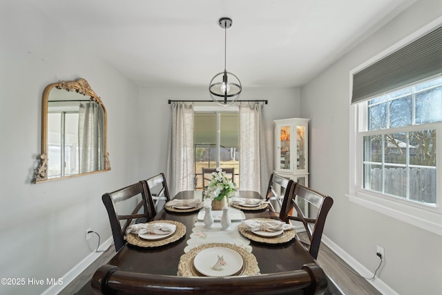 722 Christine Ave, Jacksonville, NC 28540 - dining space with baseboards and wood finished floors