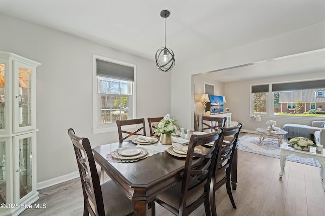 722 Christine Ave, Jacksonville, NC 28540 - dining area featuring baseboards and wood finished floors
