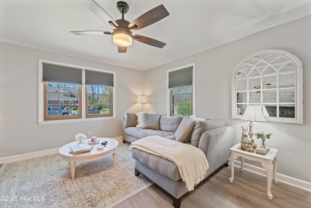 722 Christine Ave, Jacksonville, NC 28540 - living room featuring baseboards, wood finished floors, and a ceiling fan