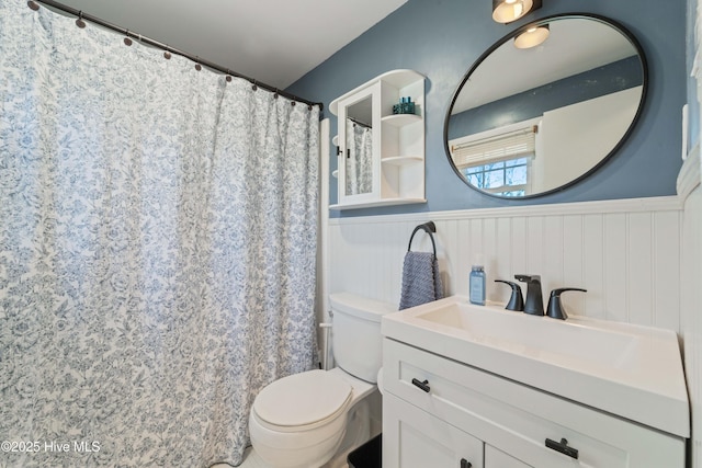 722 Christine Ave, Jacksonville, NC 28540 - bathroom featuring a wainscoted wall, toilet, and vanity