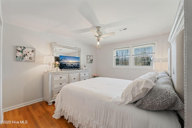 722 Christine Ave, Jacksonville, NC 28540 - bedroom featuring baseboards, visible vents, ceiling fan, and light wood-type flooring