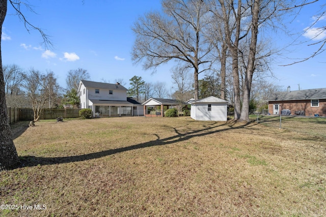 722 Christine Ave, Jacksonville, NC 28540 - view of yard with a fenced backyard and an outbuilding