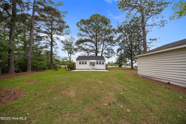 705 W Main St, Conway, NC 27820 - view of green lawn with a patio area