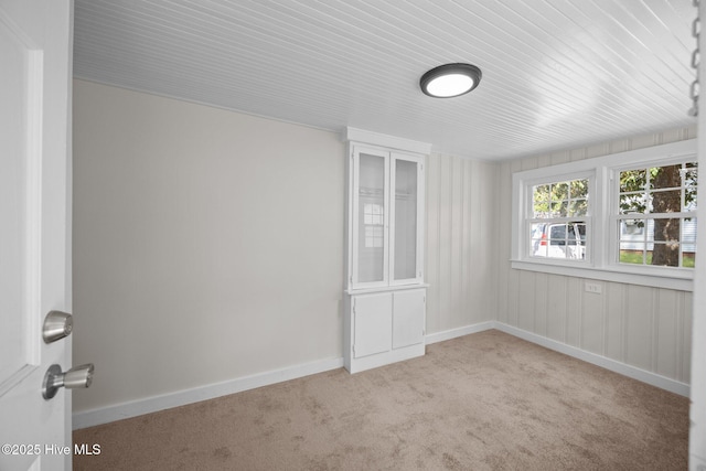 705 W Main St, Conway, NC 27820 - carpeted empty room featuring baseboards