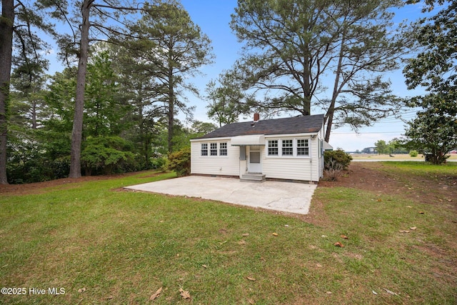 705 W Main St, Conway, NC 27820 - rear view of house with entry steps, a patio area, and a yard
