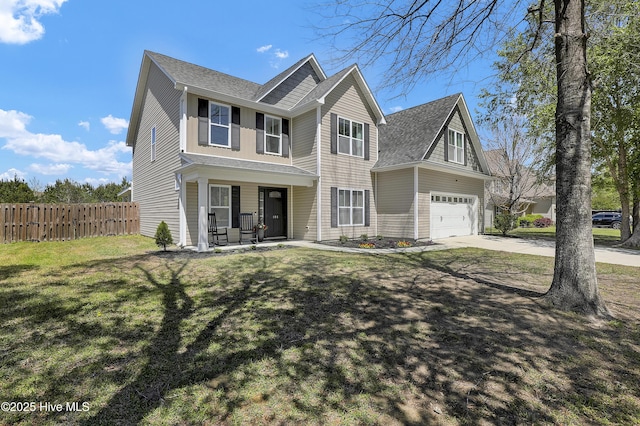 traditional-style home with driveway, an attached garage, a front yard, a porch, and fence