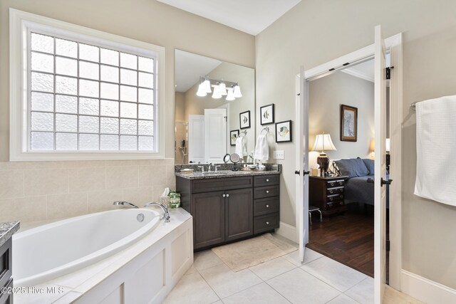 1502 Crows Landing Cir, Wilmington, NC 28403 - full bathroom with ensuite bath, vanity, a garden tub, tile patterned flooring, and a shower