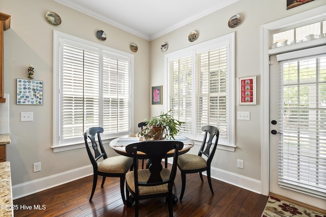 1502 Crows Landing Cir, Wilmington, NC 28403 - dining space with dark wood-style flooring, baseboards, and crown molding