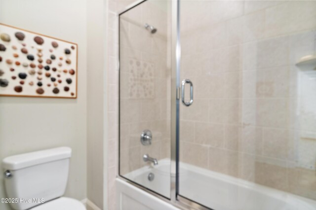 1502 Crows Landing Cir, Wilmington, NC 28403 - full bath featuring toilet, combined bath / shower with glass door, and baseboards