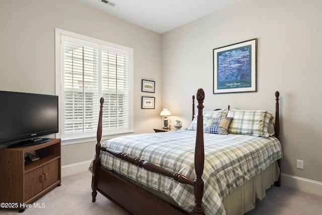 1502 Crows Landing Cir, Wilmington, NC 28403 - carpeted bedroom featuring baseboards and multiple windows