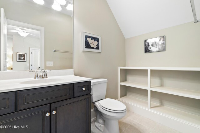 1502 Crows Landing Cir, Wilmington, NC 28403 - bathroom featuring tile patterned floors, lofted ceiling, toilet, ceiling fan, and vanity