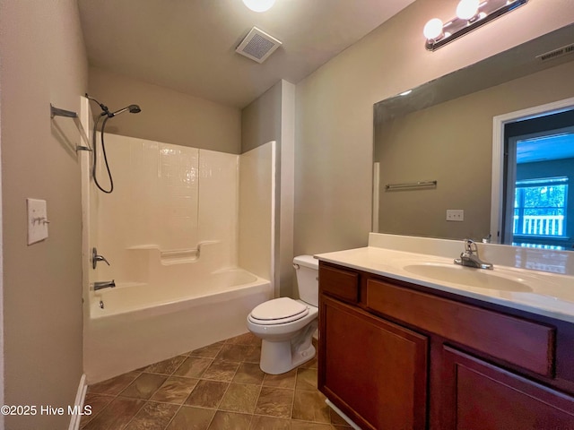 full bath with toilet, vanity, tile patterned floors, and tub / shower combination