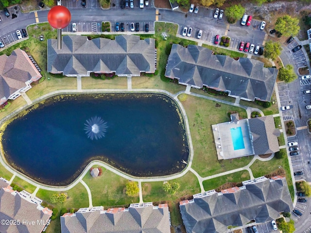 aerial view of property's location featuring a pool