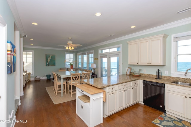 2216 S Shore Dr Unit A & B, Surf City, NC 28445 - kitchen with a peninsula, dishwasher, ornamental molding, dark wood finished floors, and a sink