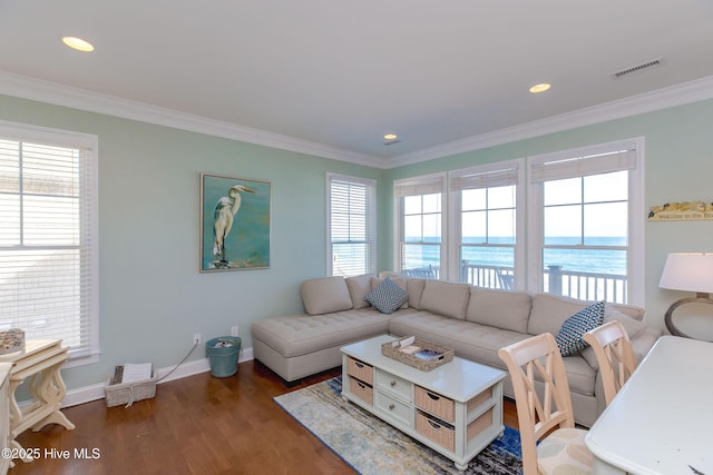 2216 S Shore Dr Unit A & B, Surf City, NC 28445 - living area with wood finished floors, crown molding, baseboards, and visible vents